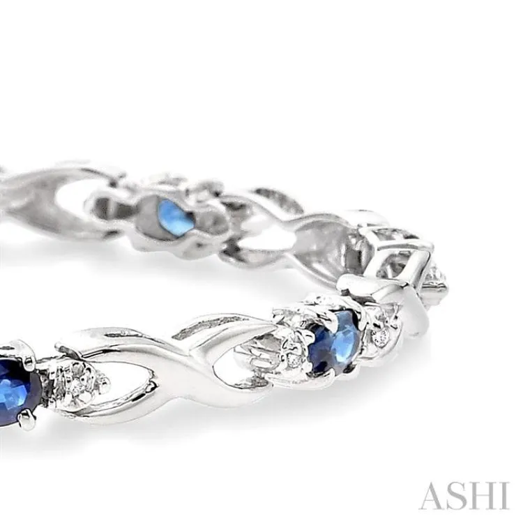 4x3mm Oval Cut Sapphire and 1/10 Ctw Single Cut Diamond Bracelet in 10K White Gold