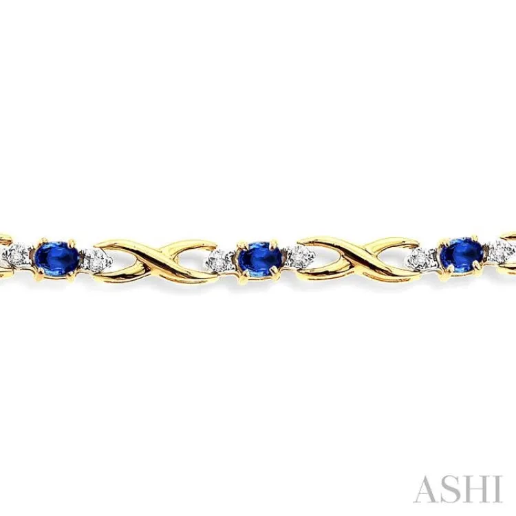 4x3mm Oval Cut Sapphire and 1/10 Ctw Single Cut Diamond Bracelet in 14K Yellow Gold