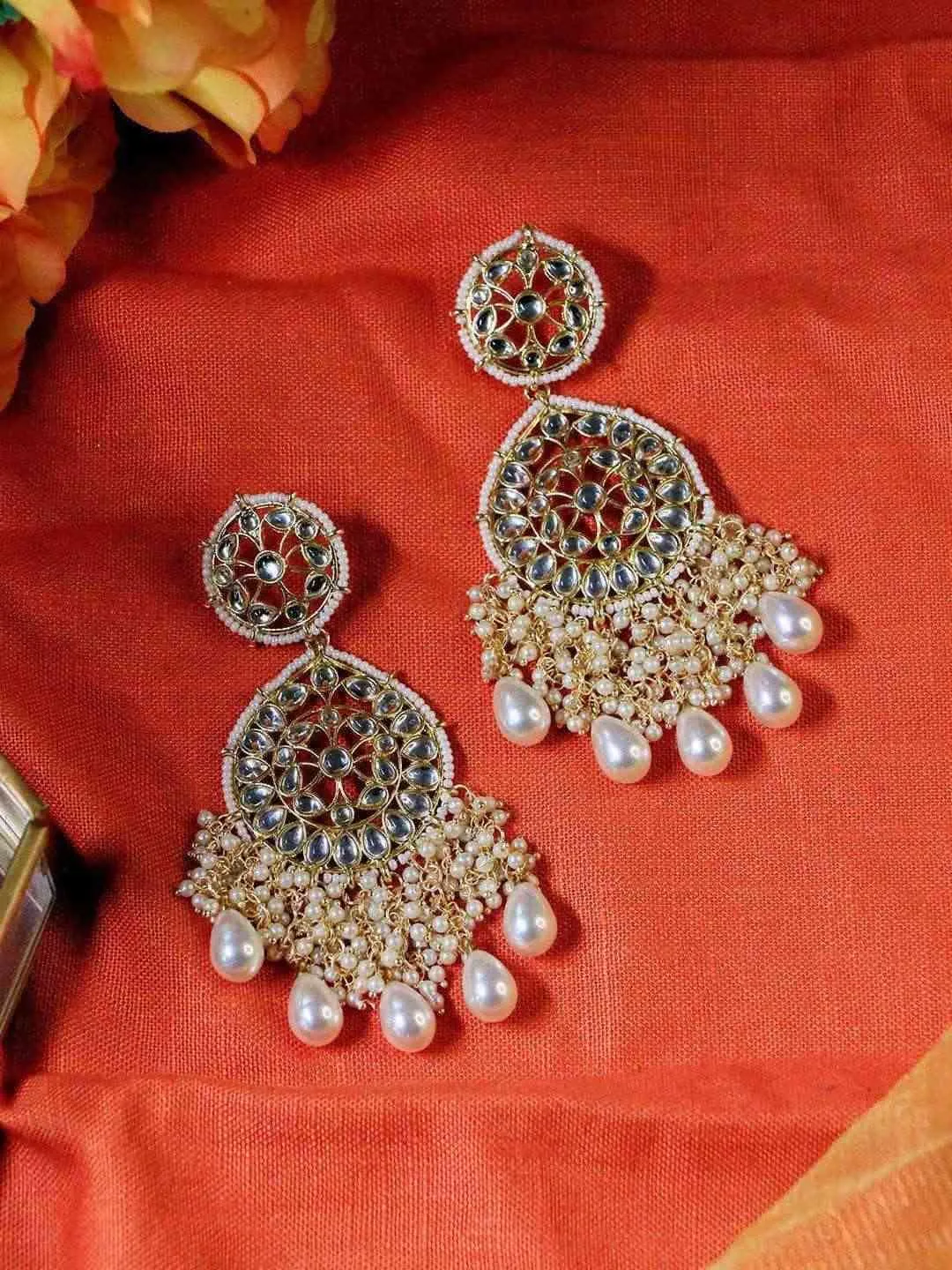 Sreenithi In Kundan Chandbali And Pearls Earrings